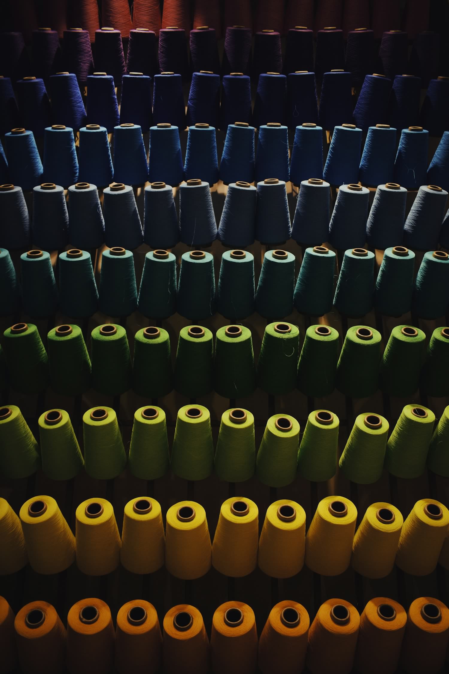 Rows of colourful textile stock at Maria Macarious